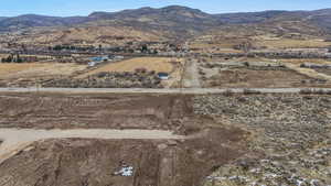Aerial view of property's location with mountains