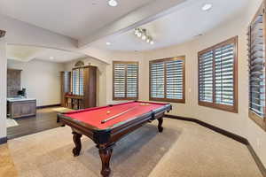Rec room featuring beam ceiling, billiards table, recessed lighting, arched walkways, and a desk
