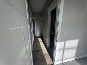 Hall featuring baseboards