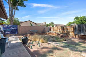 View of fenced backyard