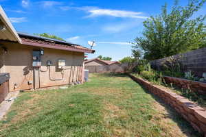 View of fenced backyard