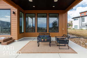 View of patio / terrace featuring an outdoor hangout area and ceiling fan