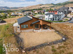 Aerial view of residential area with a mountain backdrop