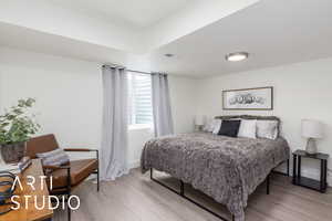 Bedroom featuring wood finished floors