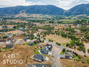 Aerial perspective of suburban area featuring mountains