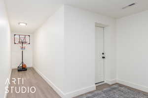 Unfurnished room with wood finished floors