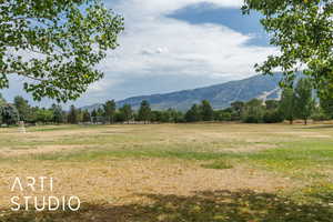View of mountain background featuring rural landscape