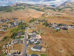 View of property location with nearby suburban area and a mountain backdrop