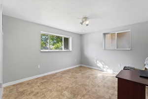 Unfurnished office with baseboards