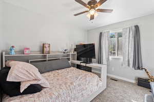 Bedroom with carpet floors and ceiling fan