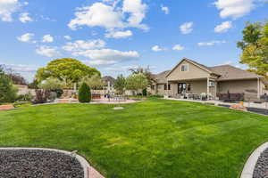 View of yard featuring a patio area and an outdoor living space