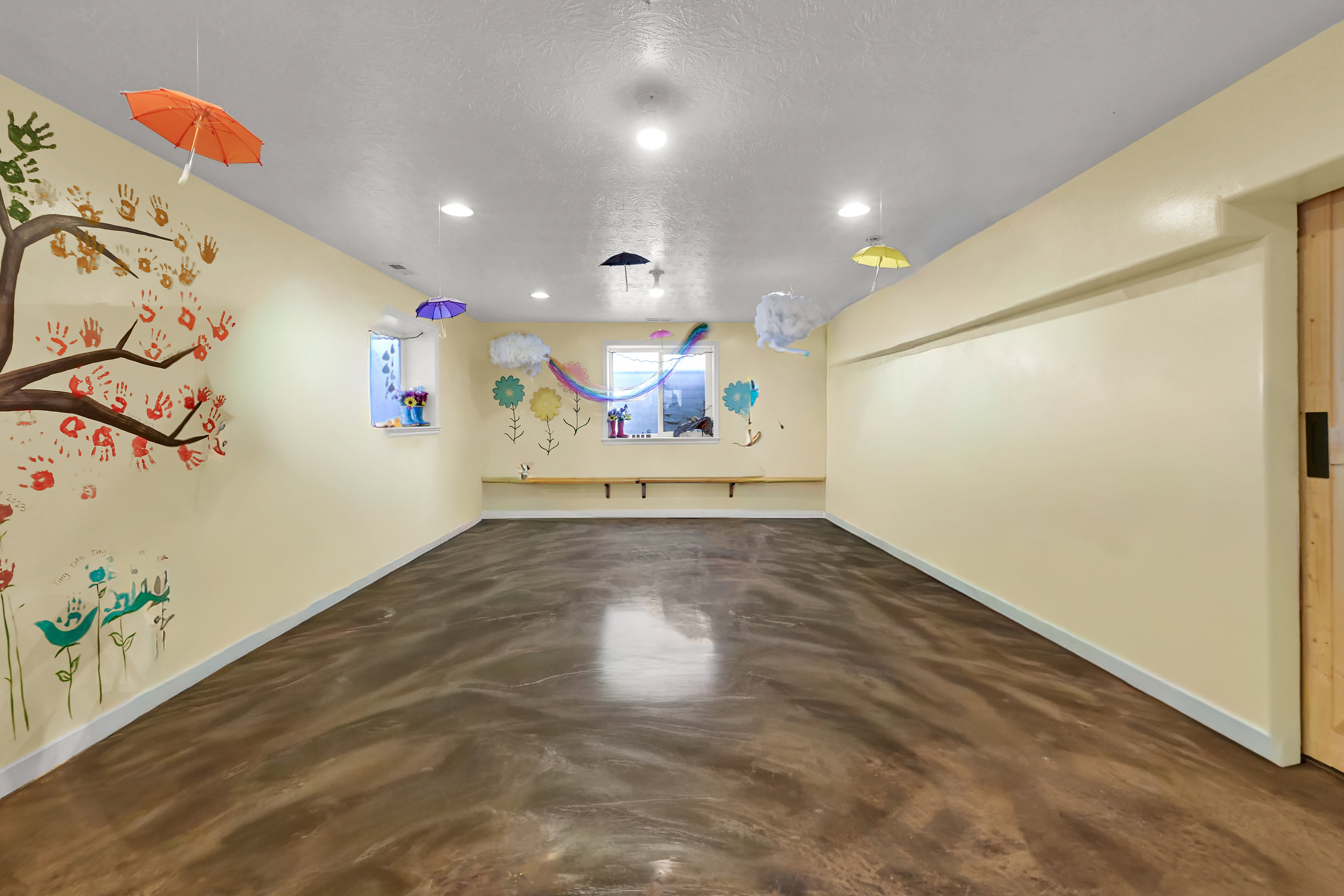 Unfurnished room featuring concrete floors, a textured ceiling, and recessed lighting