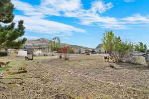View of yard with a mountain view