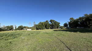 View of yard featuring a view of rural / pastoral area