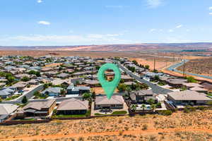 Aerial view of residential area featuring a desert landscape