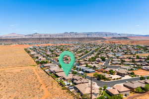 Aerial perspective of suburban area with mountains
