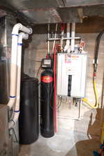 Utility room featuring Tankless Water Heater, Water Softener, Humidifier and Air Cleaner!