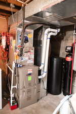 Utility room featuring Tankless Water Heater, Water Softener, Humidifier and Air Cleaner!