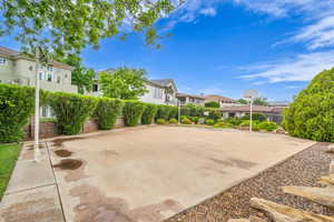 View of patio / terrace with a residential view and community basketball court