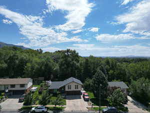 View of subject property featuring a mountainous background
