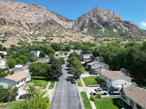 Aerial perspective of suburban area featuring mountains