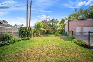 View of fenced backyard