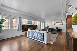 Living room with beautiful stained glass windows and patio access