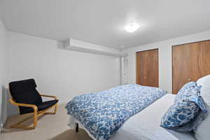 Bedroom 2 featuring two closets