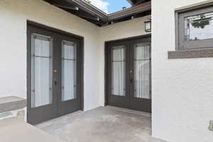 Patio with french doors to living room and dining room