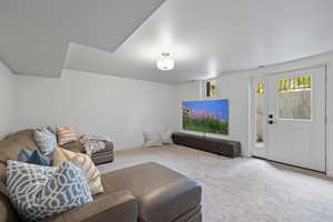 Living room with exterior entrance