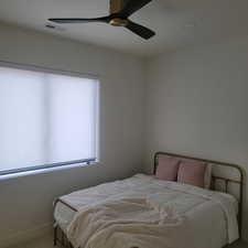 Bedroom featuring ceiling fan and recessed lighting