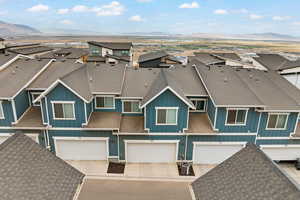 Aerial perspective of suburban area featuring mountains