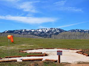 View of mountain background featuring rural landscape