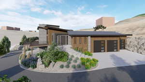 Contemporary home featuring a garage and concrete driveway