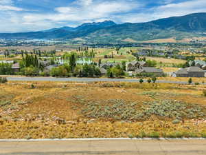 Mountain view featuring a nearby body of water