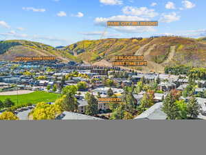 View of mountain backdrop with nearby suburban area