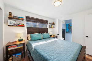 Bedroom featuring wood finished floors