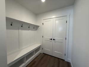 Mudroom with dark wood-style floors