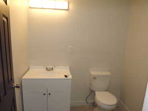 Bathroom with vanity and tile patterned floors