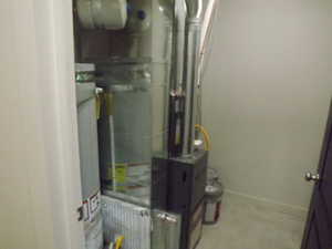 Utilities with gas water heater and heating unit