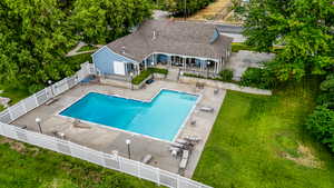 Community pool featuring a patio area
