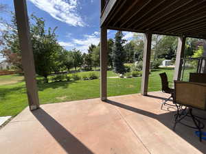 View of patio featuring an outdoor structure