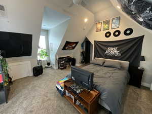 Bedroom with lofted ceiling, carpet floors, recessed lighting, and ceiling fan