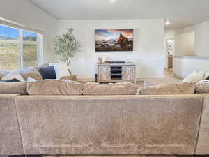 Living room featuring baseboards and wood finished floors
