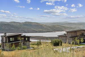 Mountain view featuring a nearby body of water