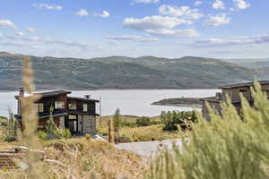 View of mountain background featuring a large body of water