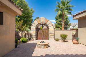 View of patio / terrace with a fire pit