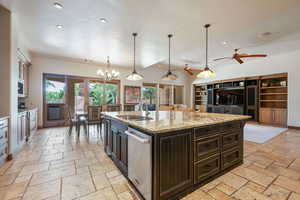 Kitchen featuring hanging light fixtures, recessed lighting, dark brown cabinetry, ceiling fan, and dishwasher
