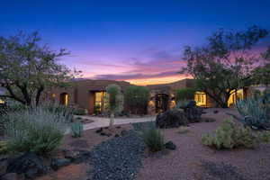 View of front of home featuring stucco siding