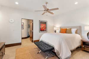 Bedroom featuring recessed lighting, light tile patterned floors, and a ceiling fan